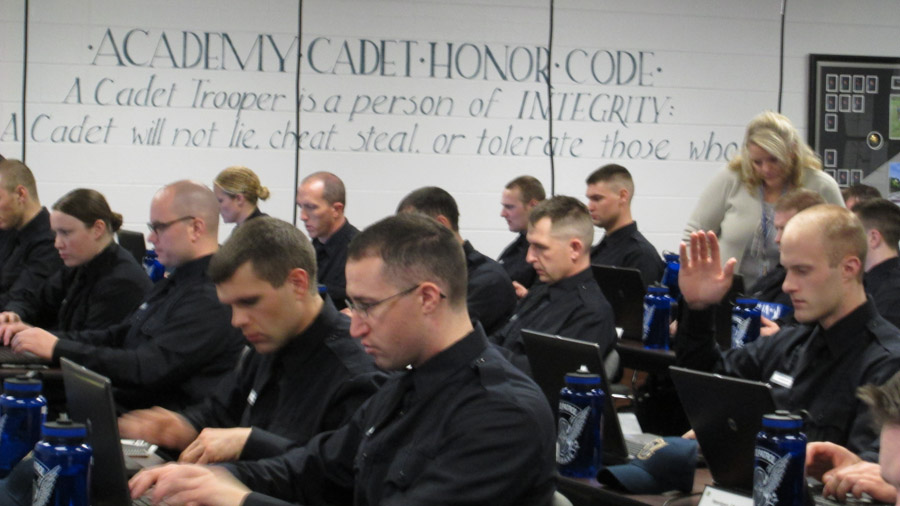 Cadets in Classroom with Honor Code on Wall