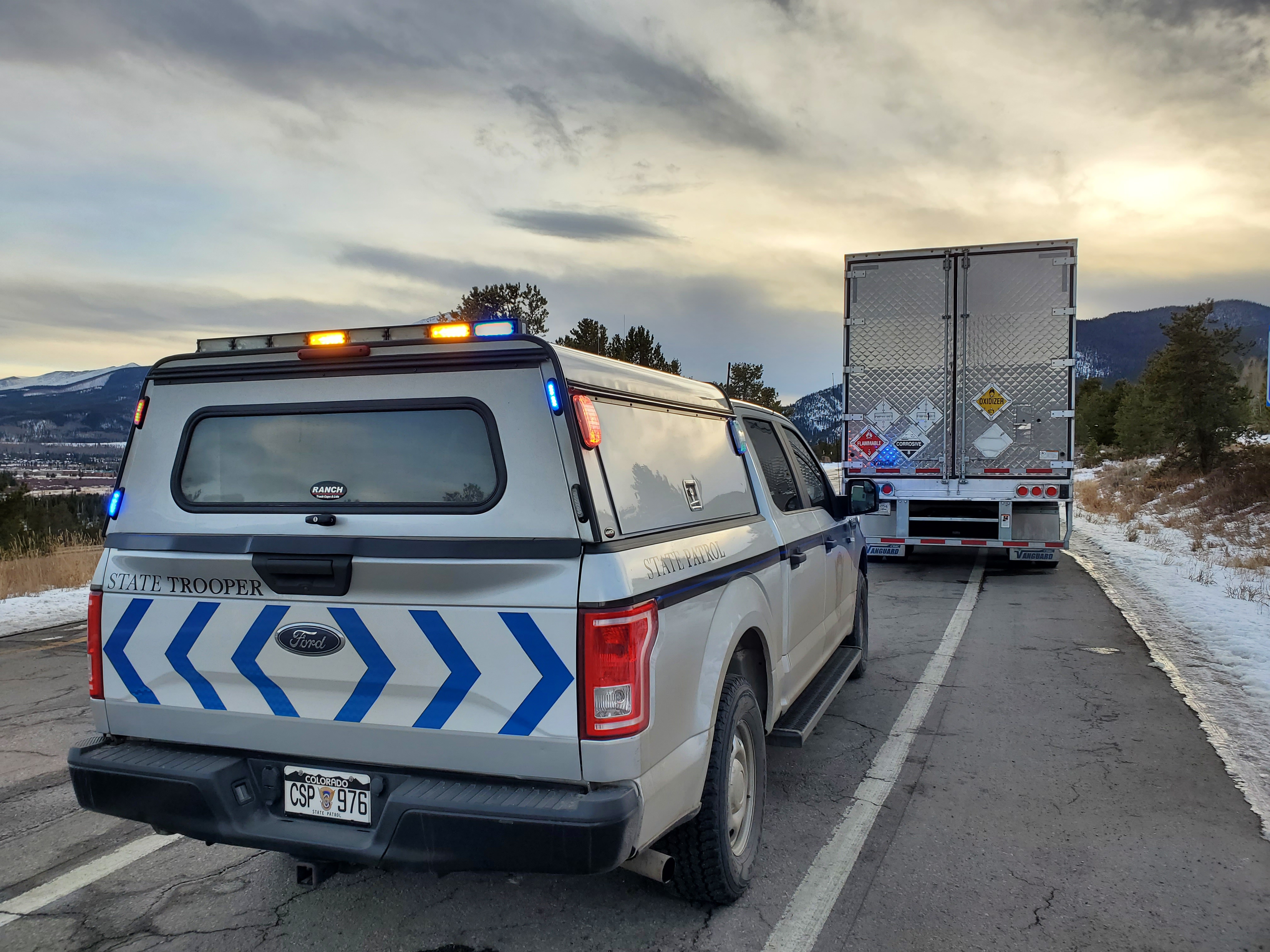 Trooper conducting traffic stop with commerical motor vehicle.