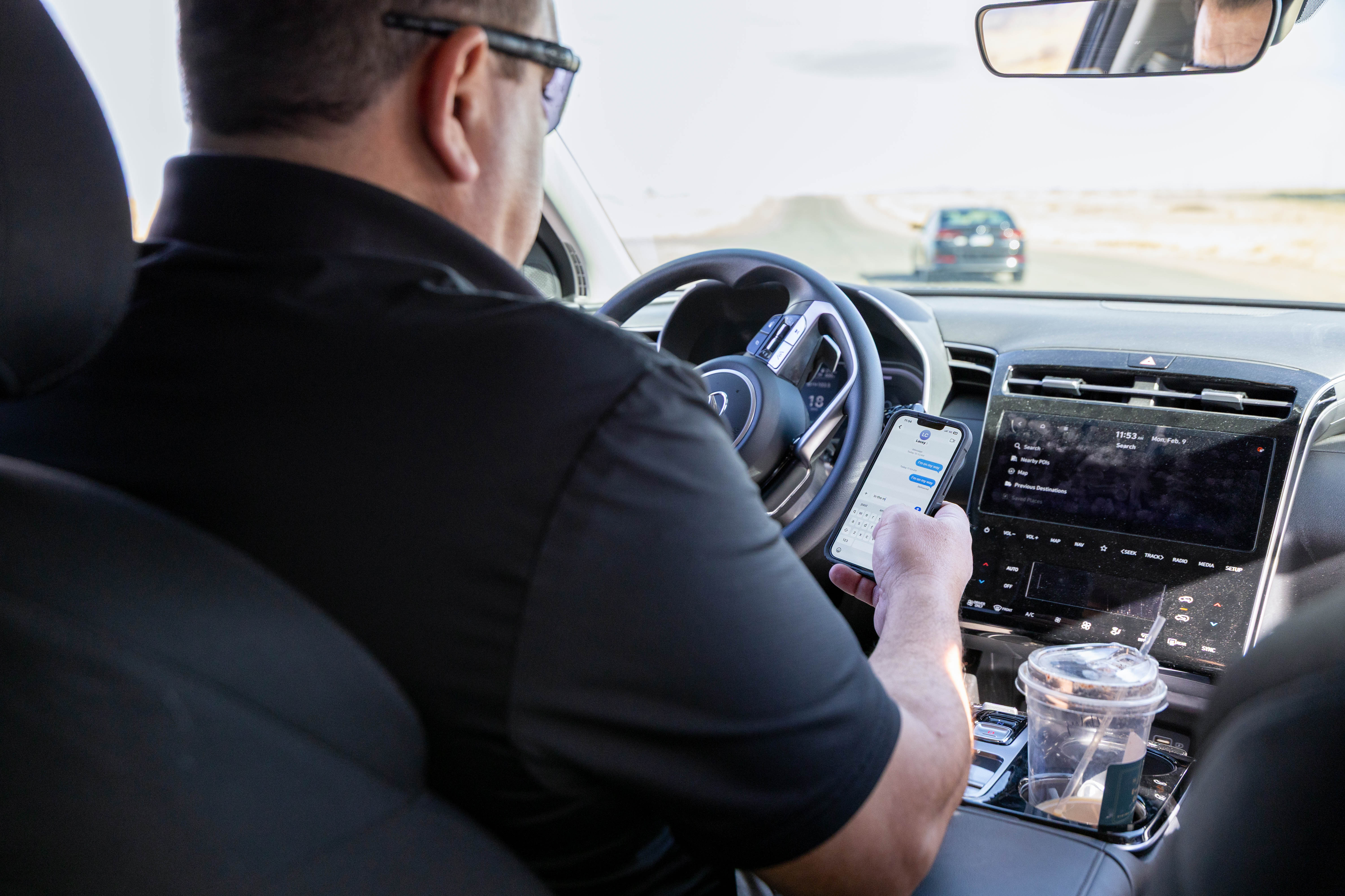 individual texting while driving. 