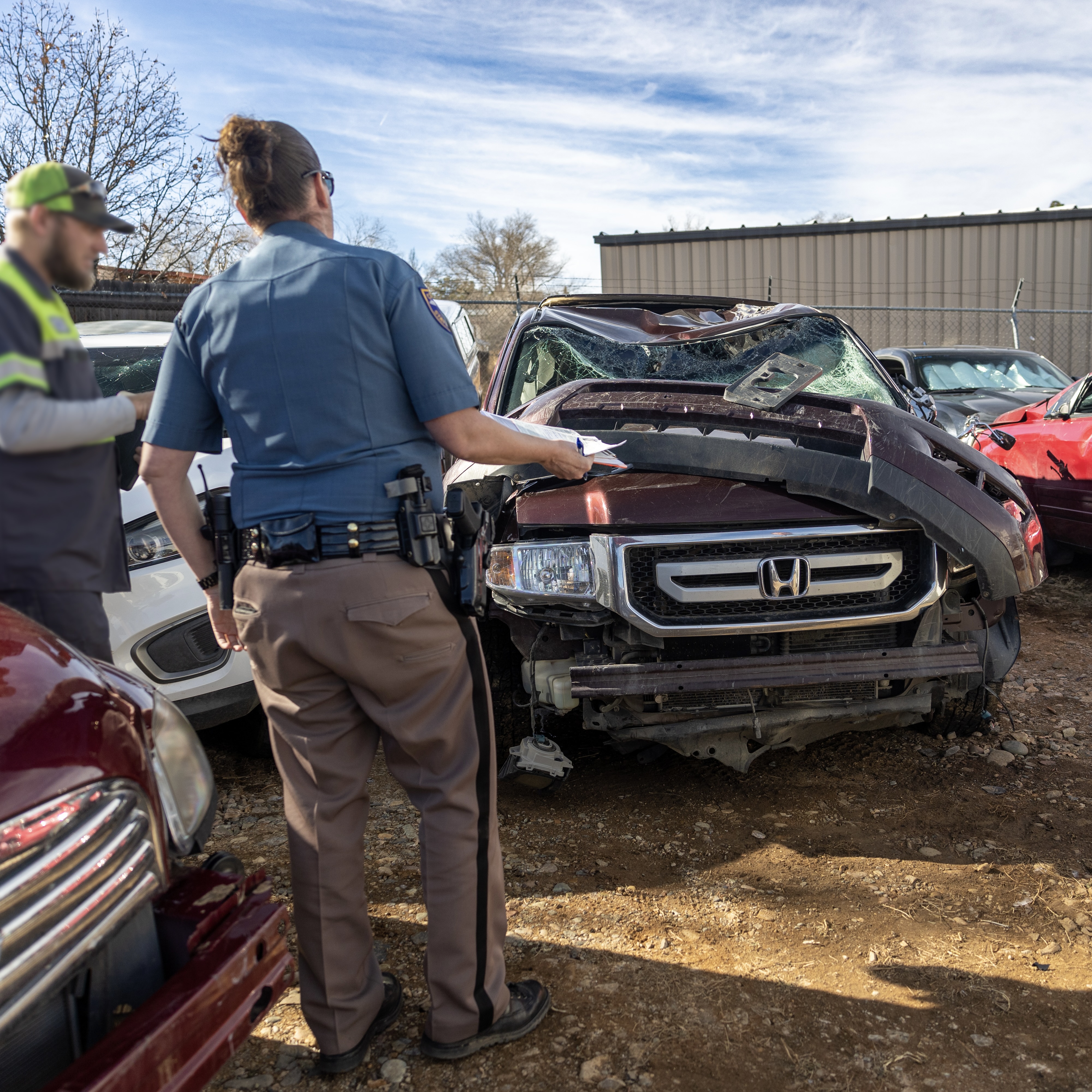 Inspection at auto yard