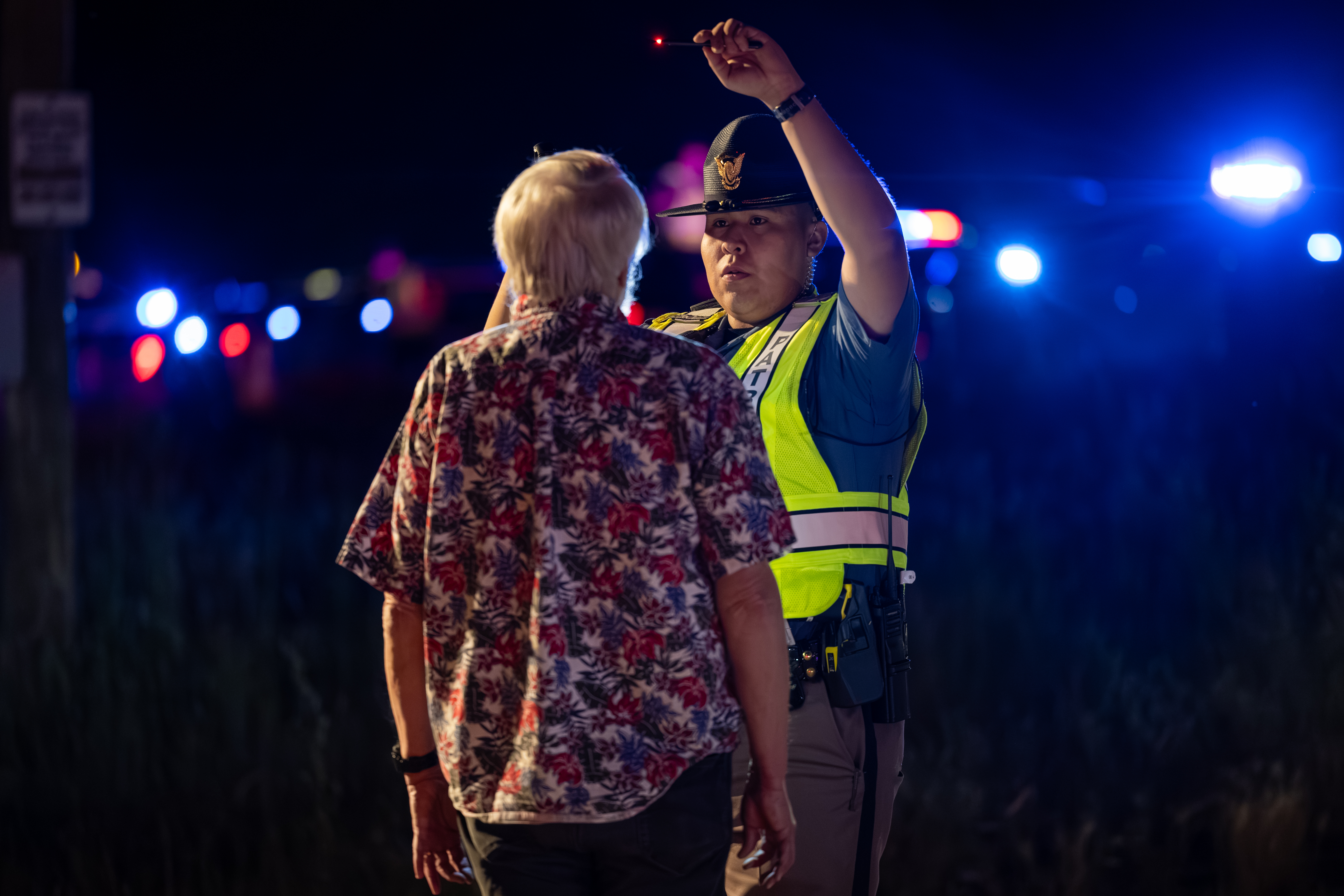 Trooper conducting roadsides with a community member.