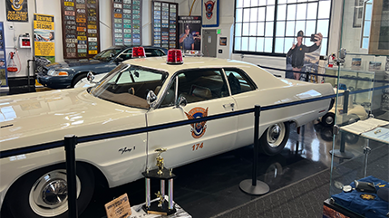 Colorado State Patrol vehicle on display in museum.